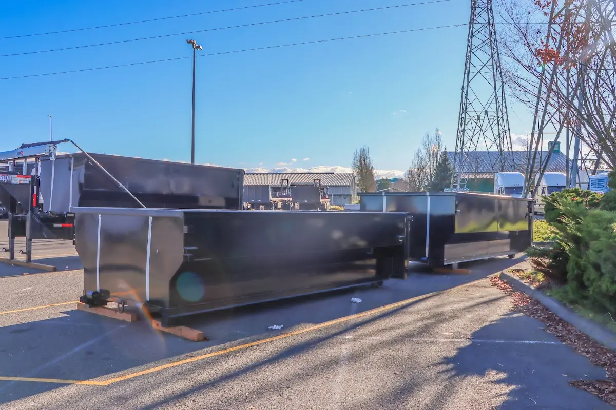 Roll-off dumpster ready for waste disposal at job site for Concrete Dumpster Rental in Brandermill